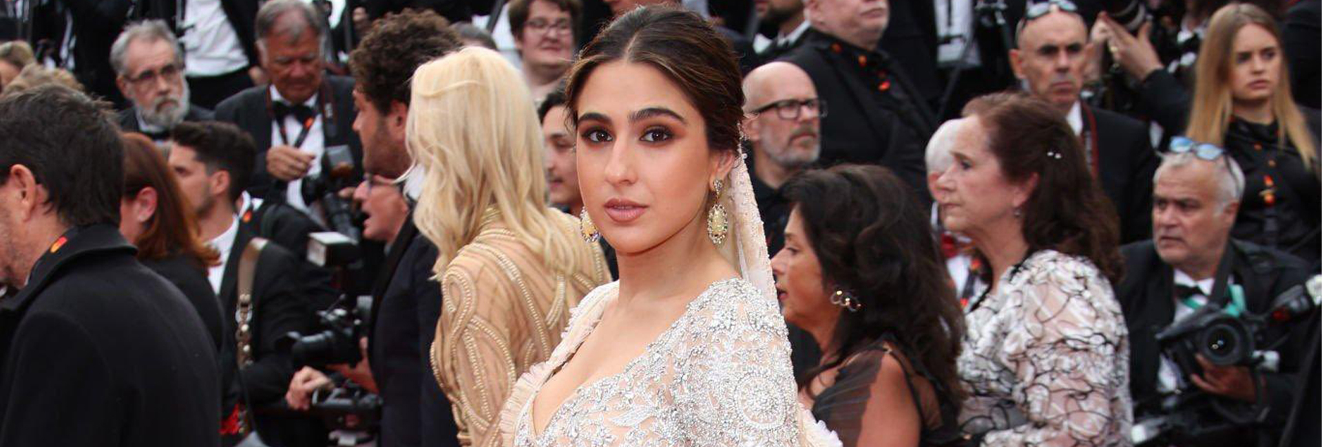 Sara Ali Khan made a stunning debut at the Cannes Film Festival 2023. She wore a handwoven ivory lehenga from the shelves of Abu Jani-Sandeep Khosla.