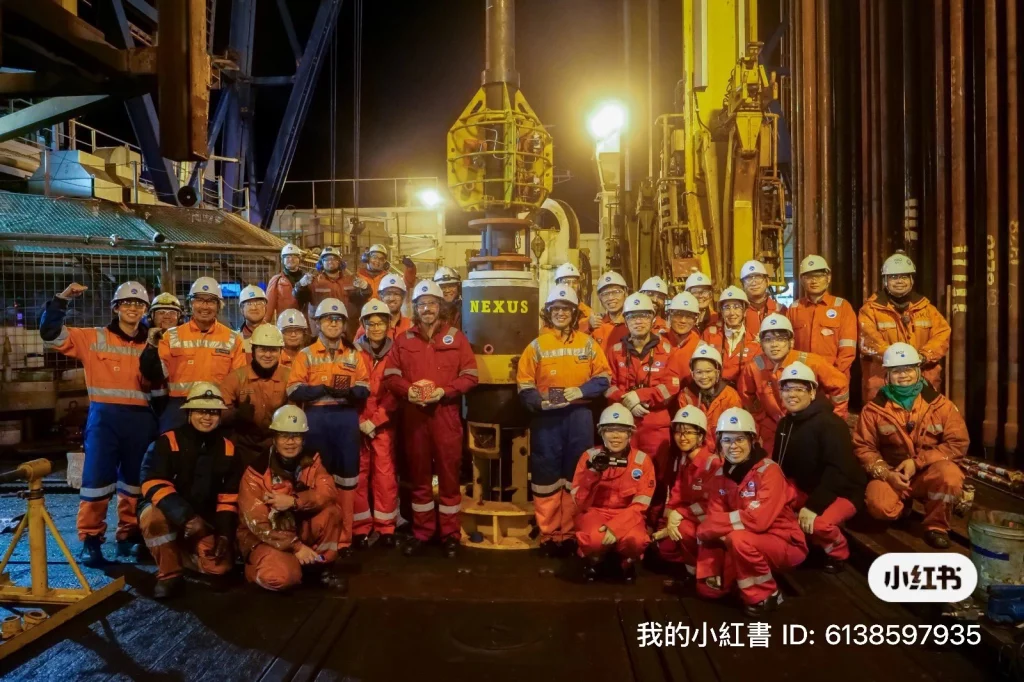 The Science team seen with the Interactions Deep Ocean cubes and the interactions installation set to make the journey to the deep from the JAMSTEC scientific vessel, the Chikyu