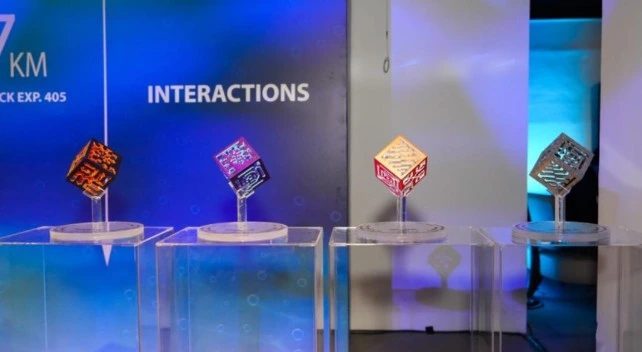 The Interactions Deep Ocean cubes. The three on the left are 3D-printed in stainless steel 316 and powder-coated. The cube on the right was created at NTU using LAPIS technology.