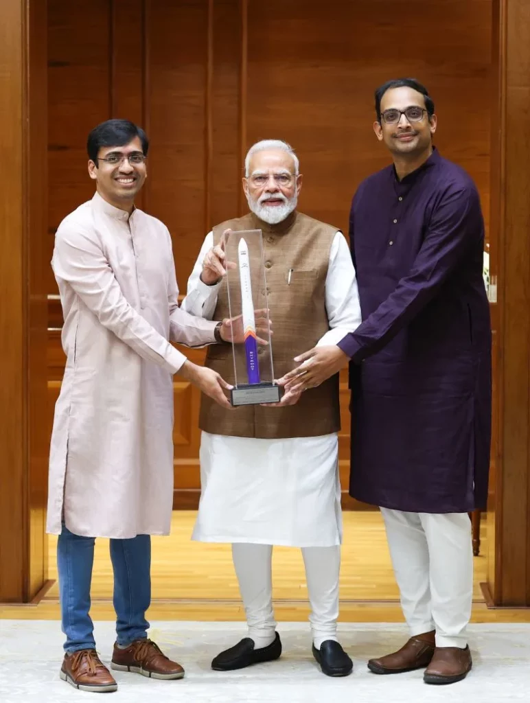 Pawan Kumar Chandana and Naga Bharath Daka with PM Modi