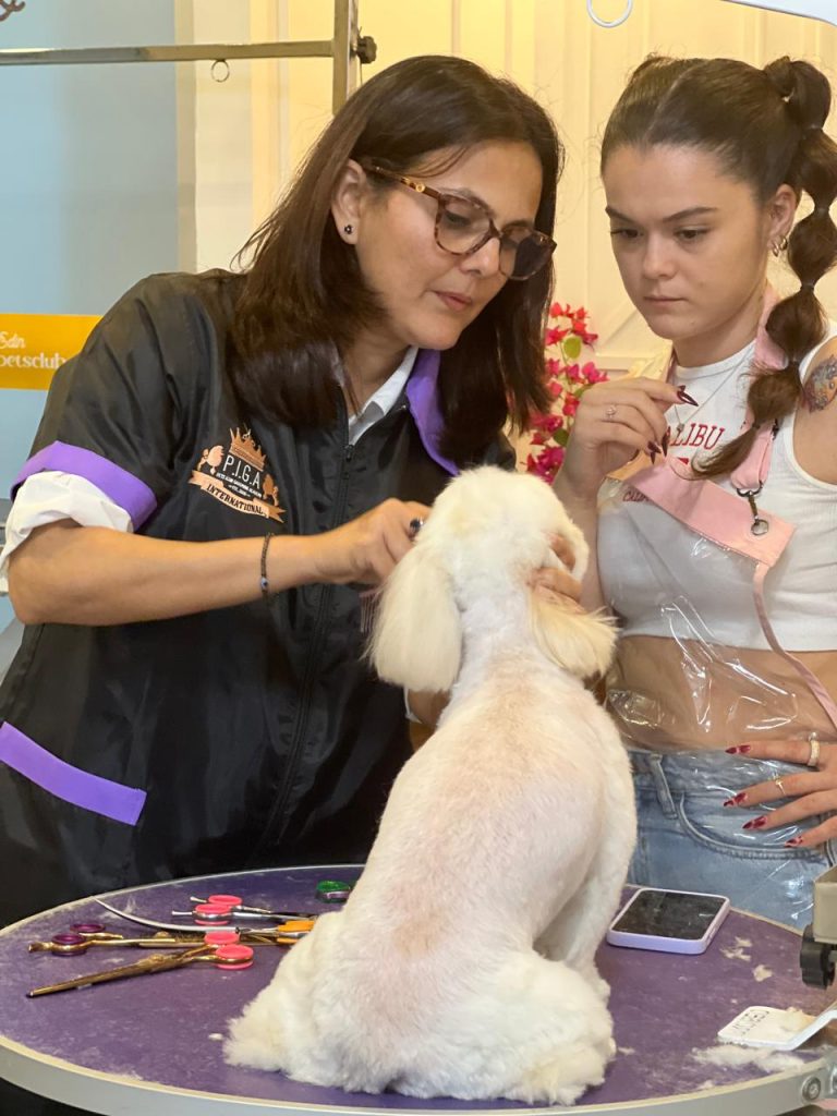 Andrea Cyrill Khurana in a pet grooming teaching session