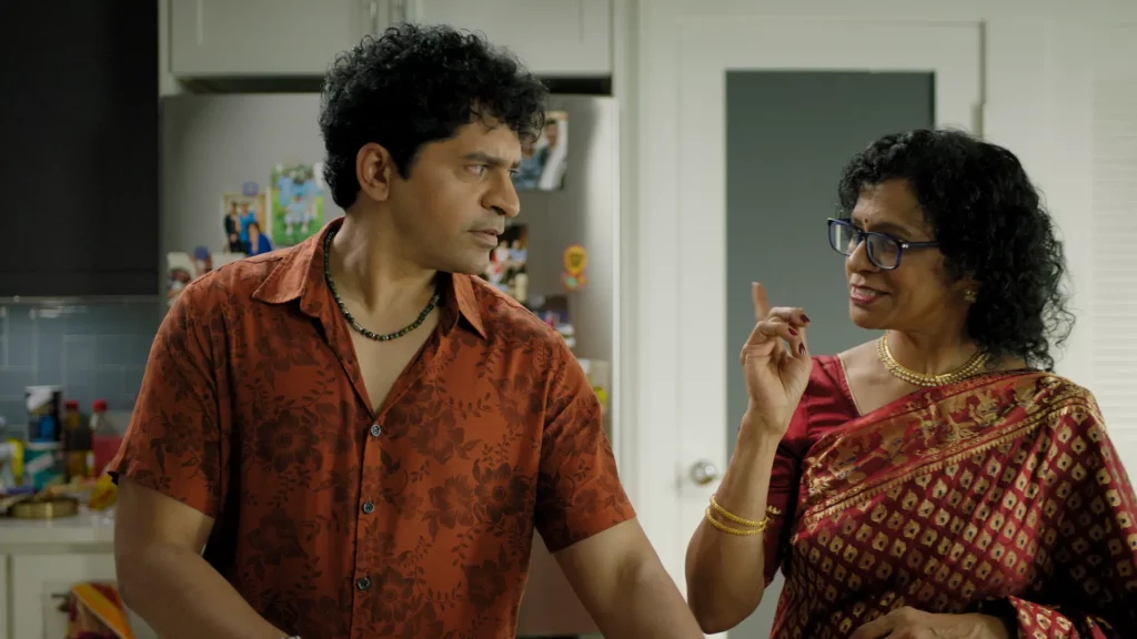 Sriram Emani with his mother in a still from the movie JAM Boy